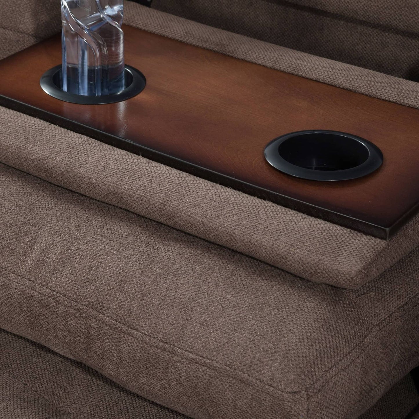 Brown wooden couch console with cup holders for living room seating