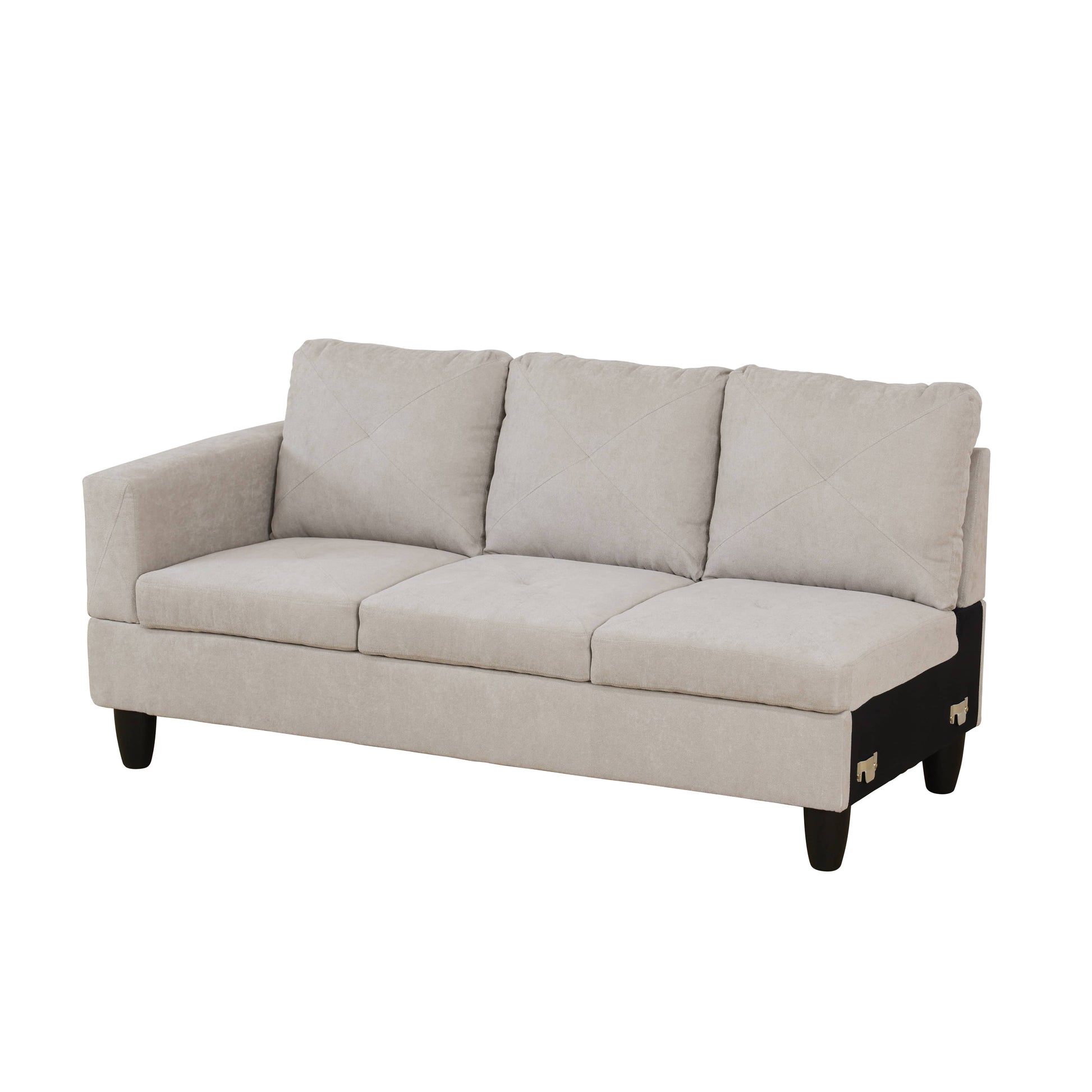 Beige upholstered threeseater sofa with diamondstitched cushions