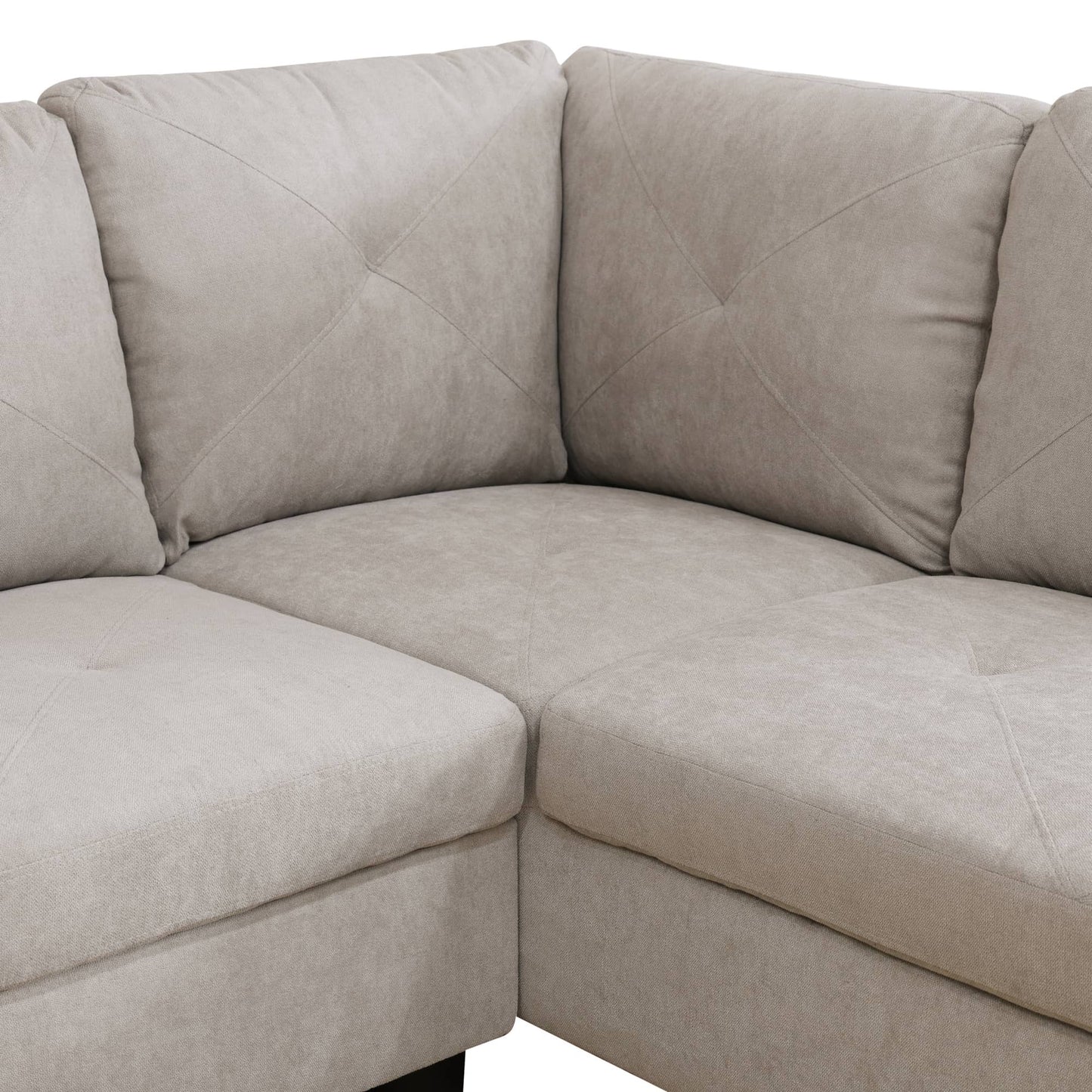 Beige fabric sectional sofa with diamond tufting on pillows