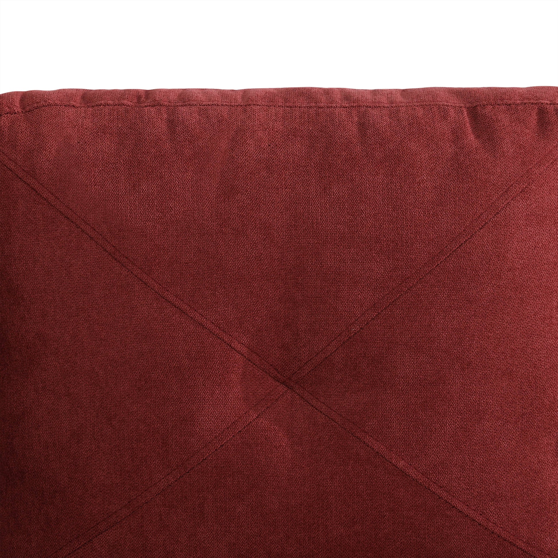 Deep red woven fabric pillow with diamond stitching detail