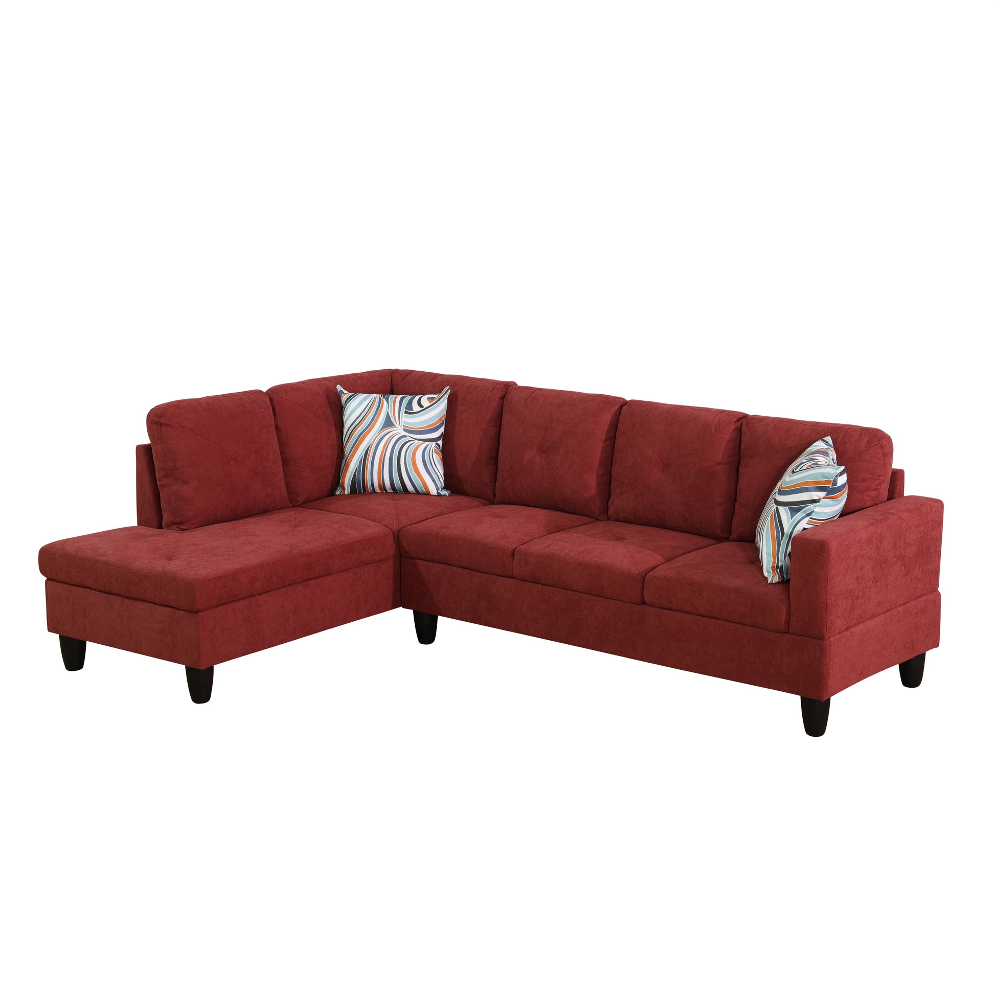 Red sectional sofa with plush fabric and geometric accent pillows