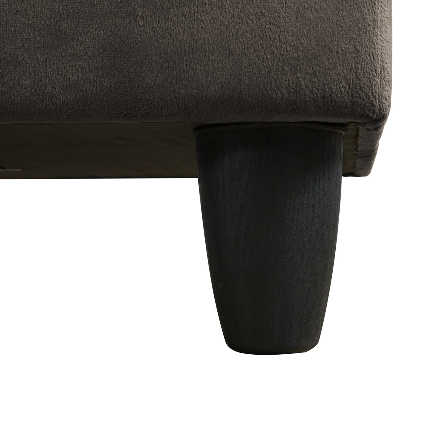 Dark grey textured fabric couch with tapered black wooden leg