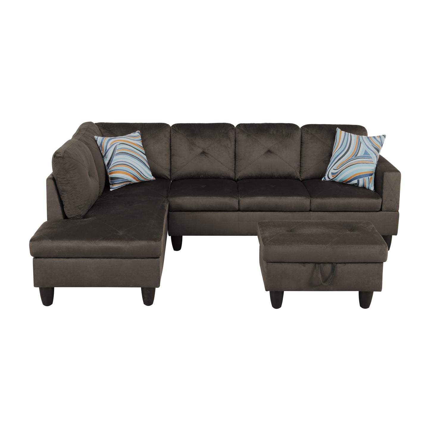 Dark brown velvet sectional sofa with patterned accent pillows and storage ottoman