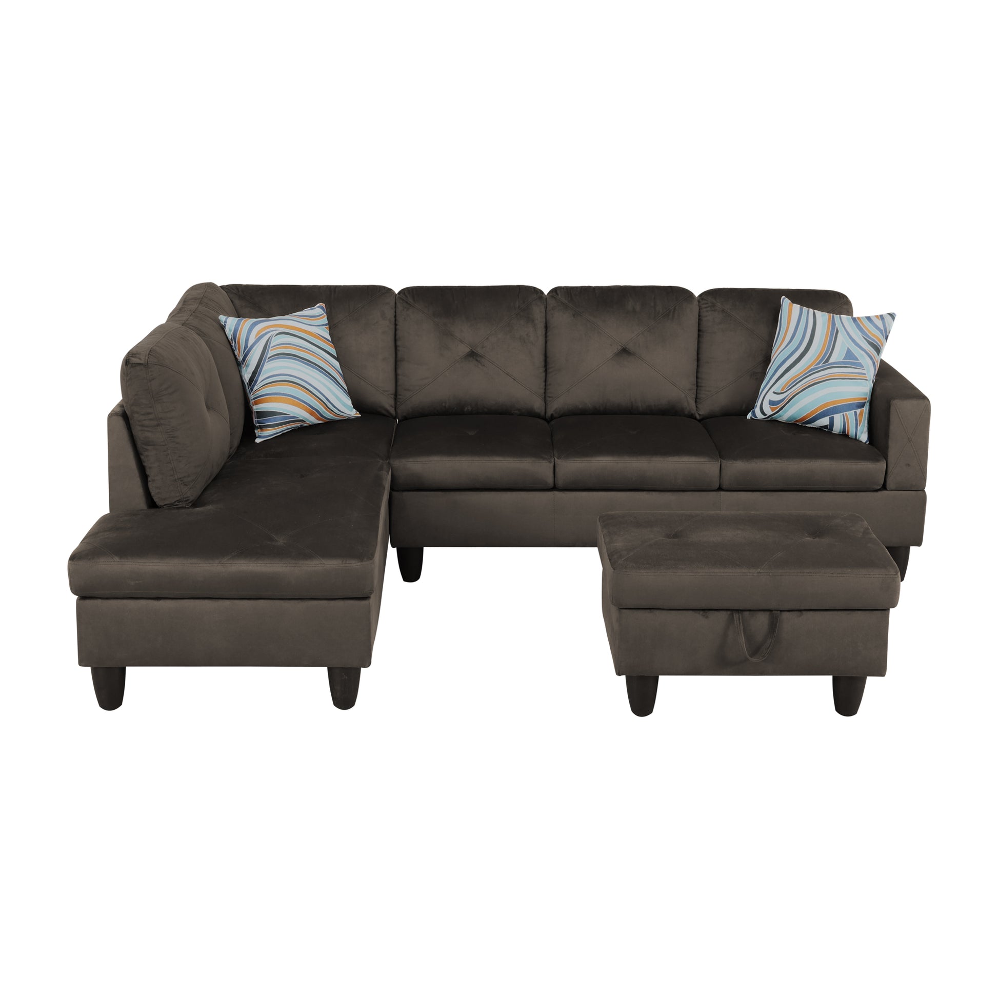 Dark brown velvet sectional sofa with patterned accent pillows and storage ottoman