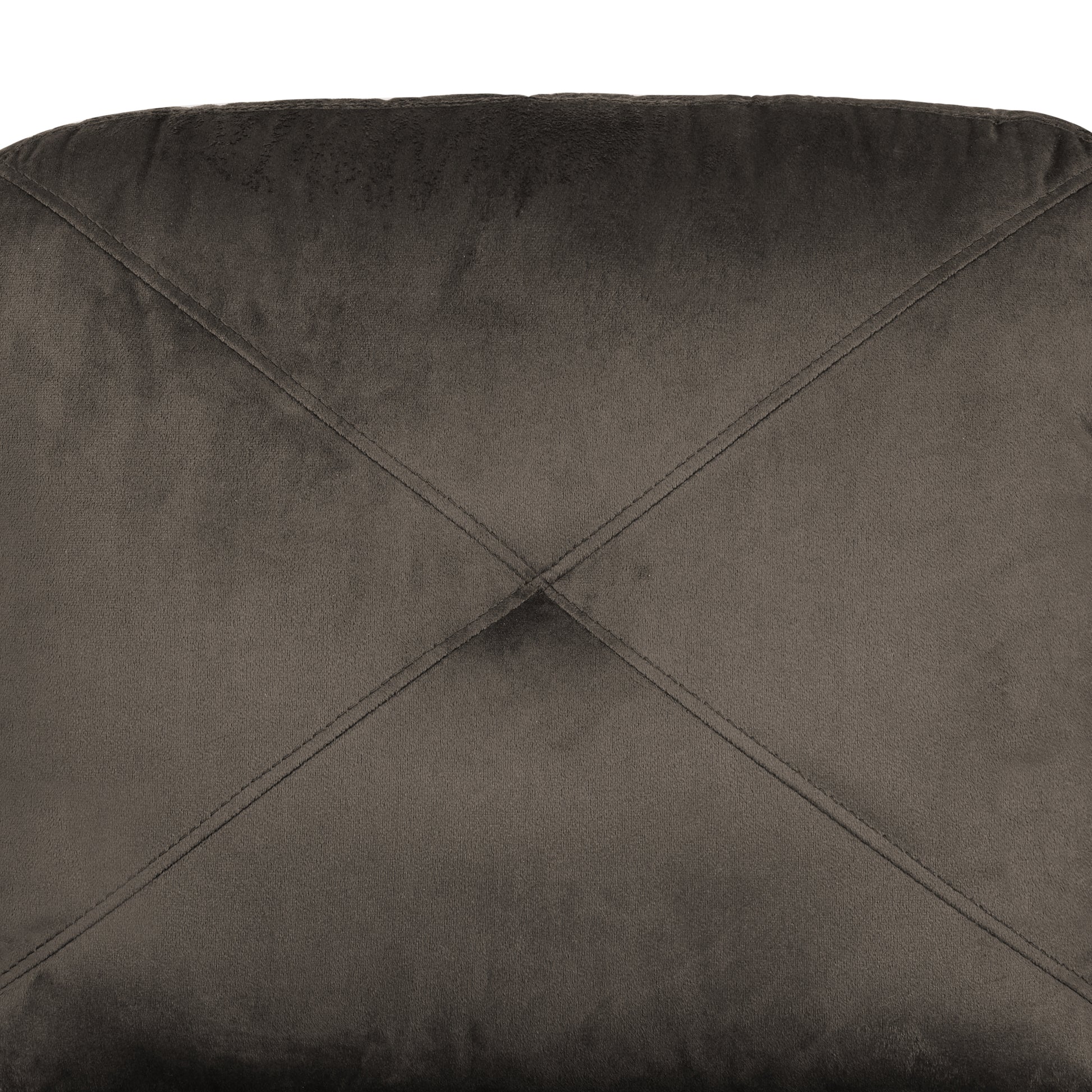 Brown velvet chair back with diamond tufting