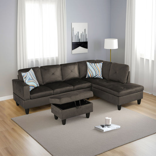 Dark grey velvet sectional sofa with tufted cushions and storage ottoman