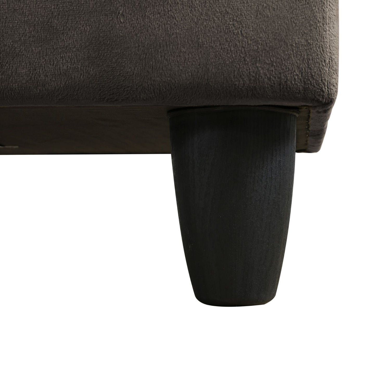 Dark grey textured fabric sofa base with tapered black wooden leg