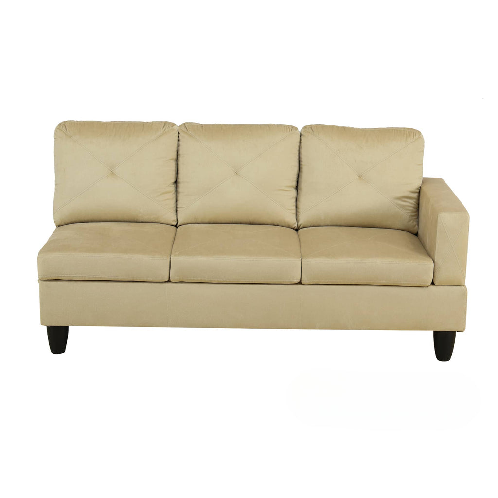 Beige velvet sectional sofa with diamondstitched back cushions and tufted seat