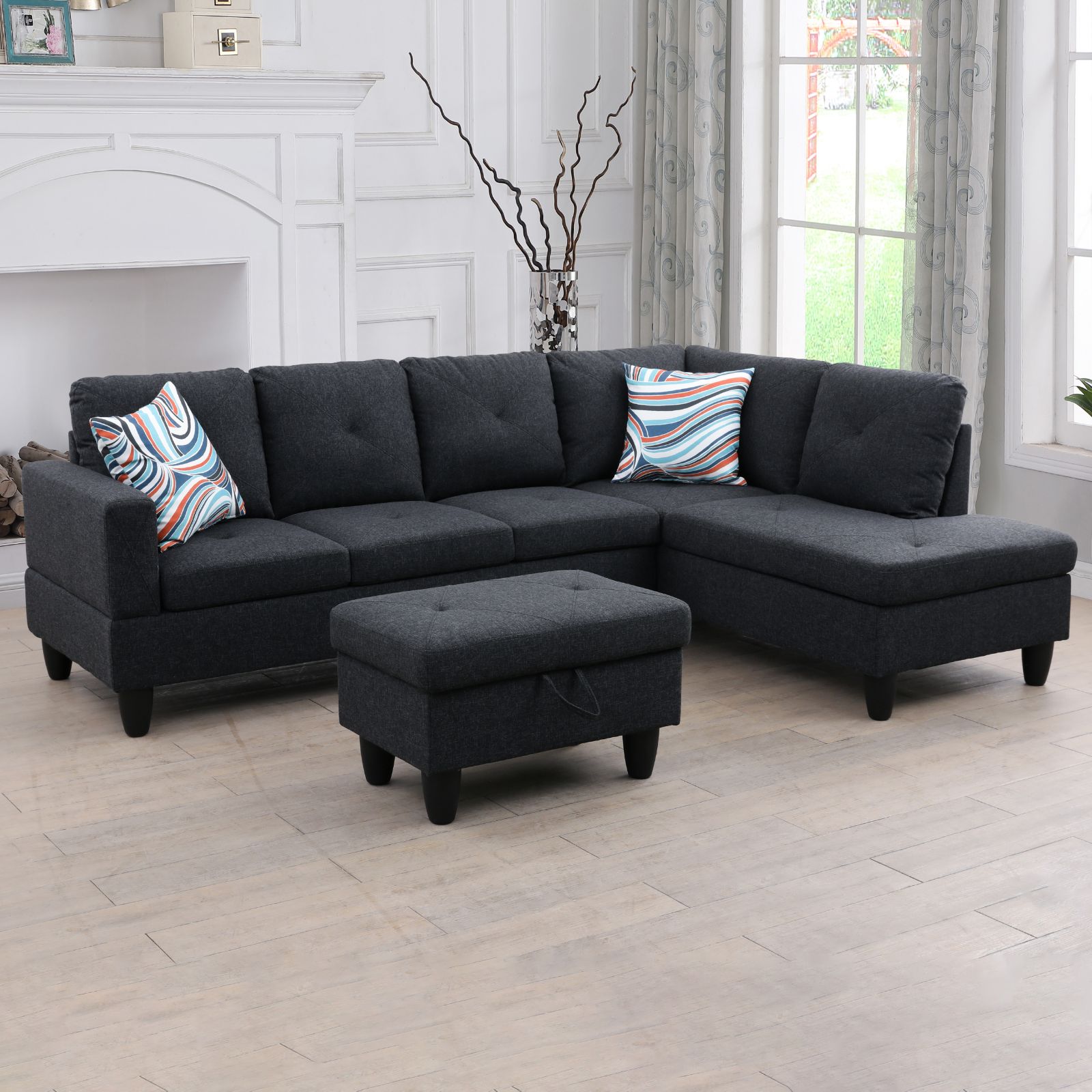 Dark grey fabric sectional sofa with chaise and storage ottoman