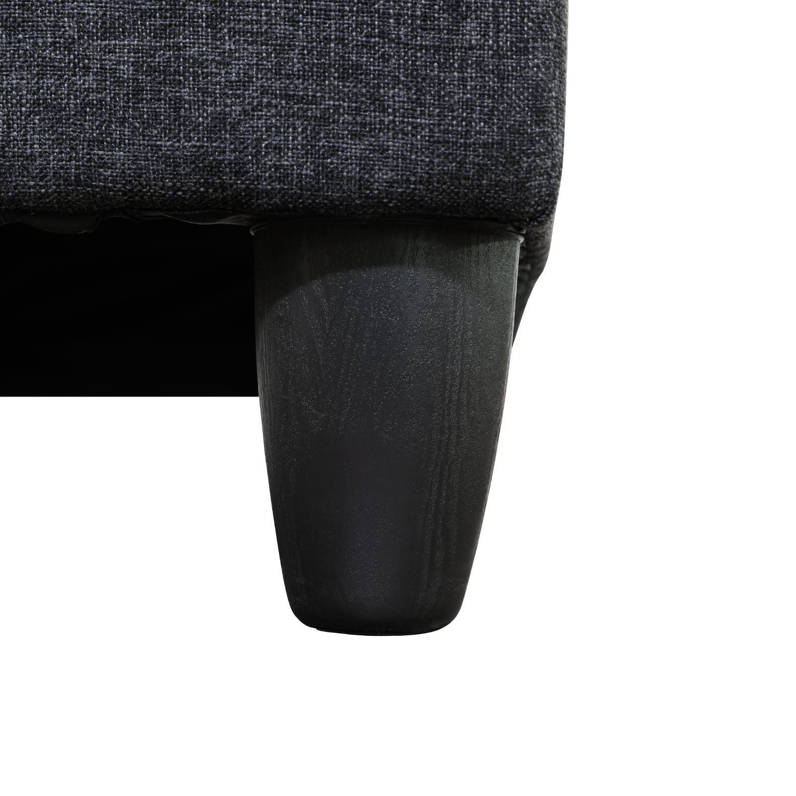 Dark gray textured fabric sofa leg base with tapered wooden foot