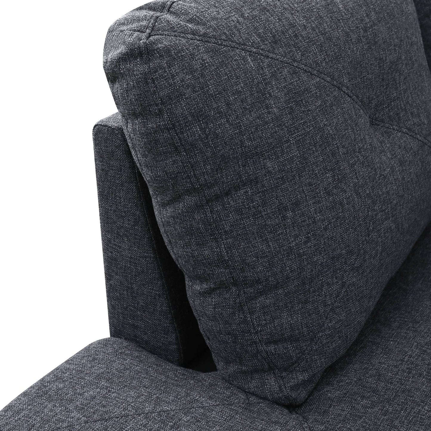 Closeup of dark grey textured fabric couch cushion with detailed stitching