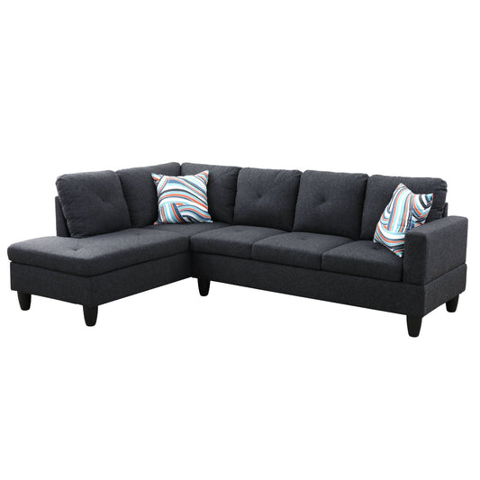 Dark grey fabric sectional sofa with chaise and striped pillows