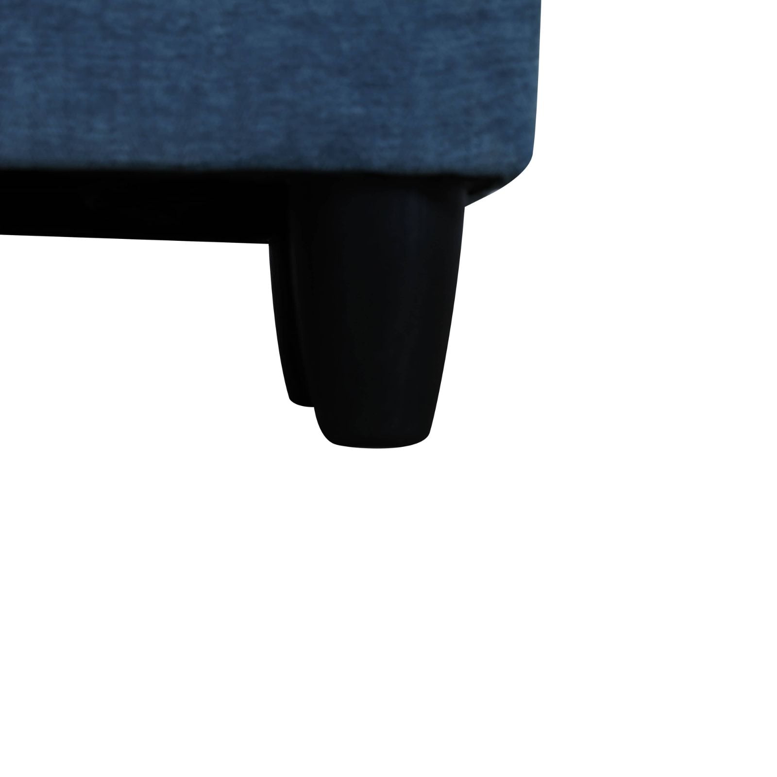 Dark blue fabric sofa corner with two black wooden legs