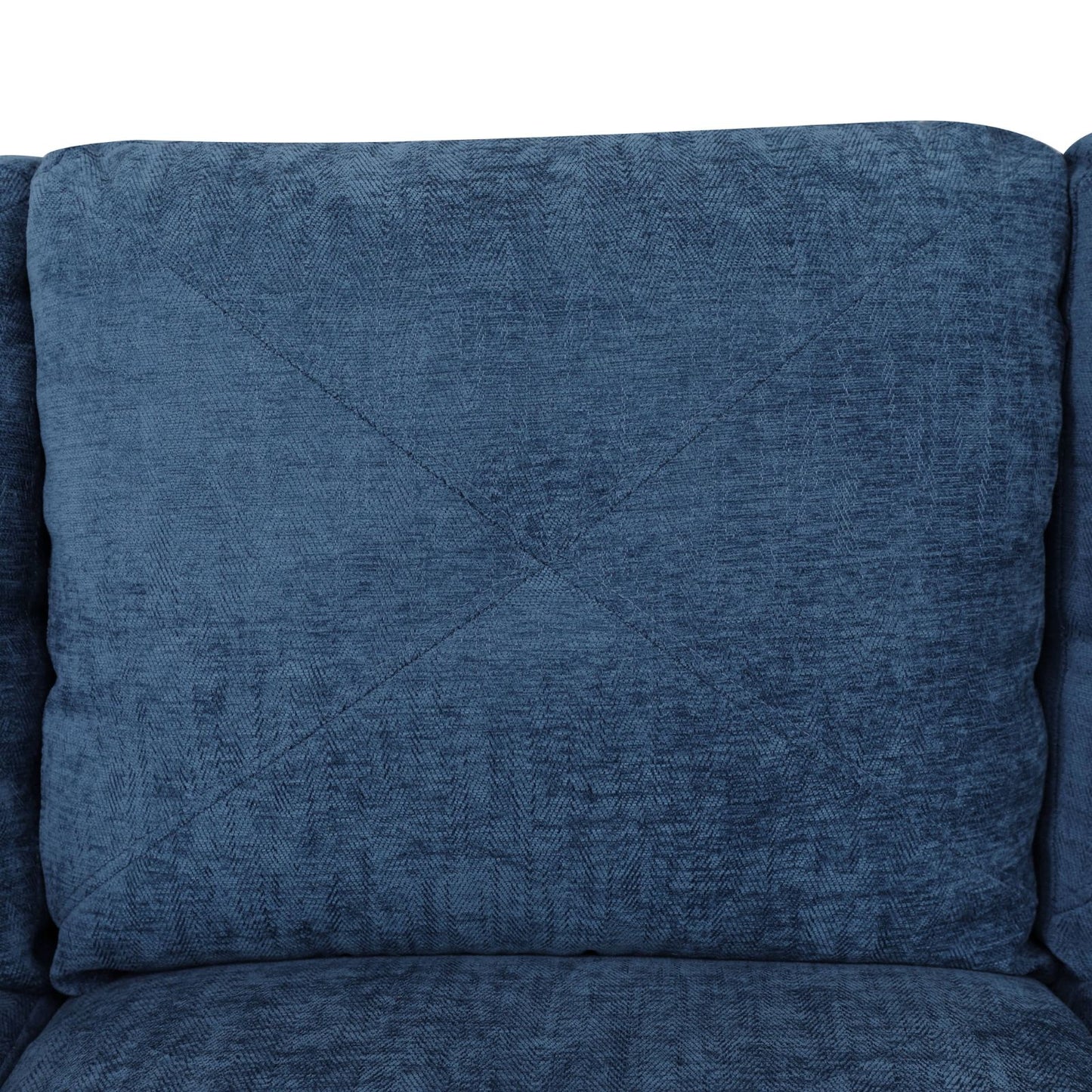 Deep blue upholstered sofa cushion with diamond stitching detail