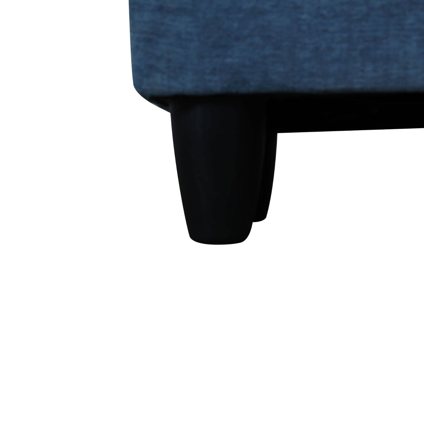 Blue velvet couch detail with tapered black legs