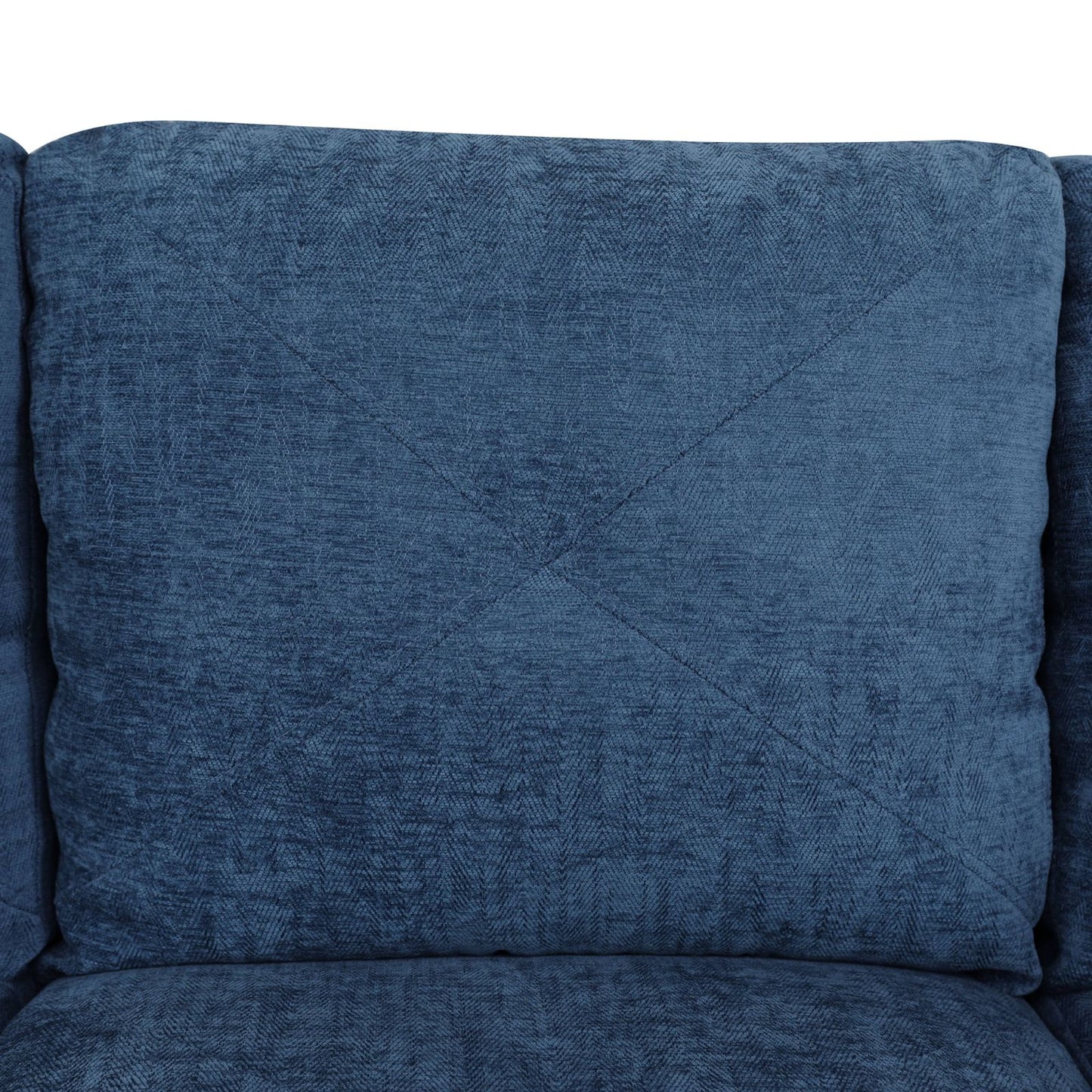 Deep blue velvet armchair cushion with subtle chevron pattern and diamond stitching
