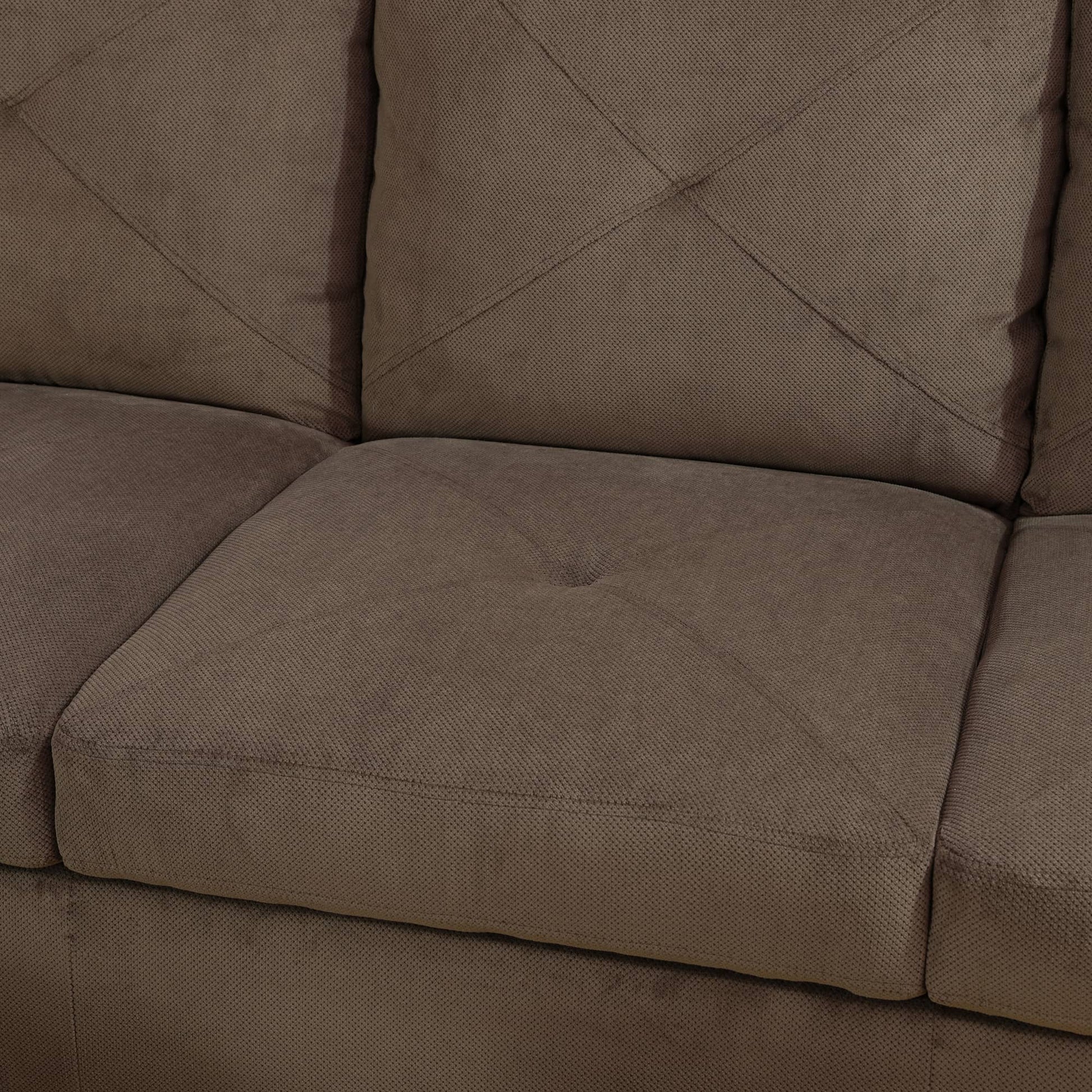 Brown textured fabric sofa cushion with diamond stitching detail