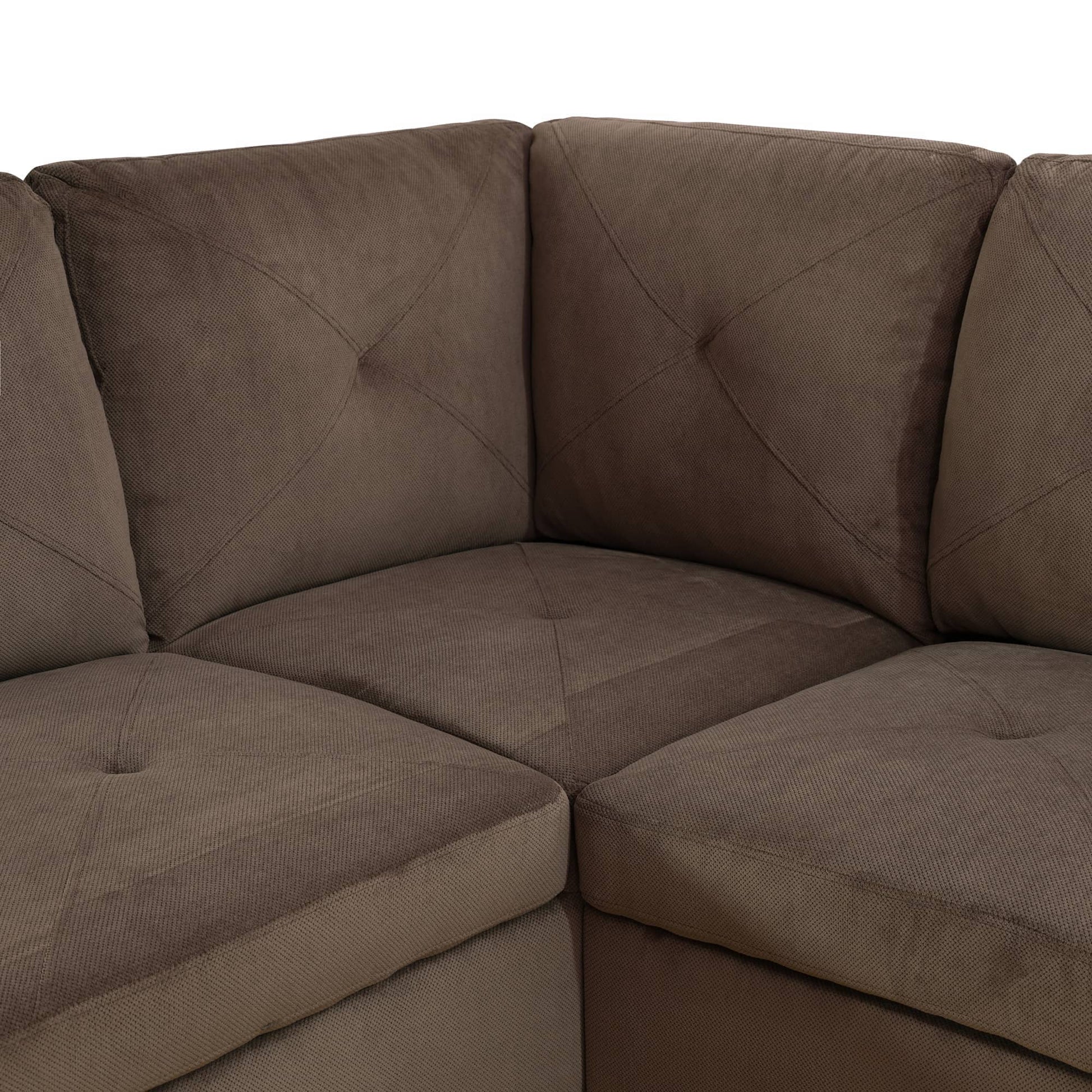 Brown fabric sectional sofa with tufted cushions and diamond stitching details