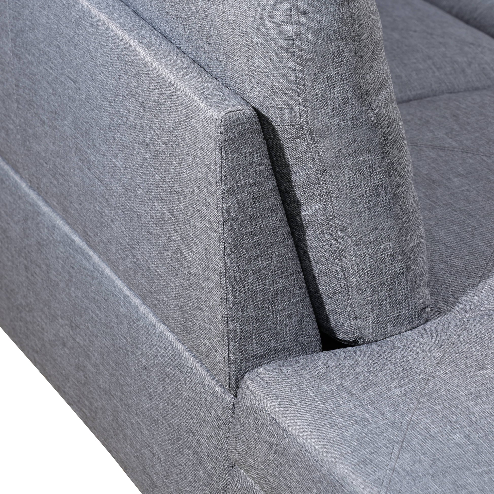 Closeup of textured grey fabric on a modern sofa