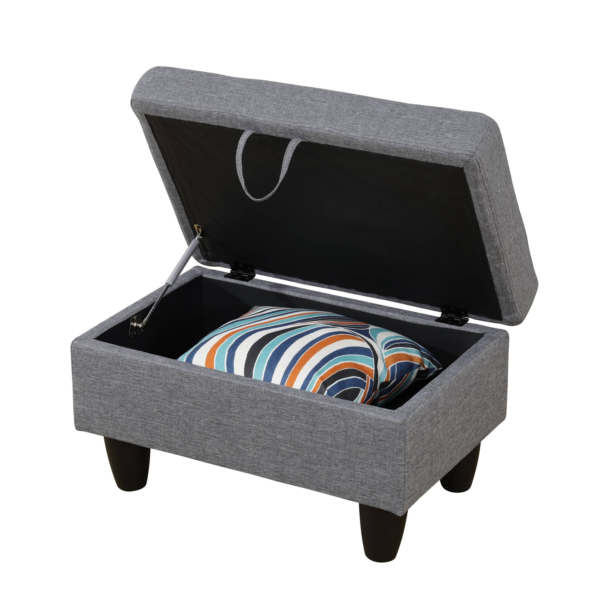 Grey fabric storage ottoman with hinged lid open revealing interior and colorful striped pillow