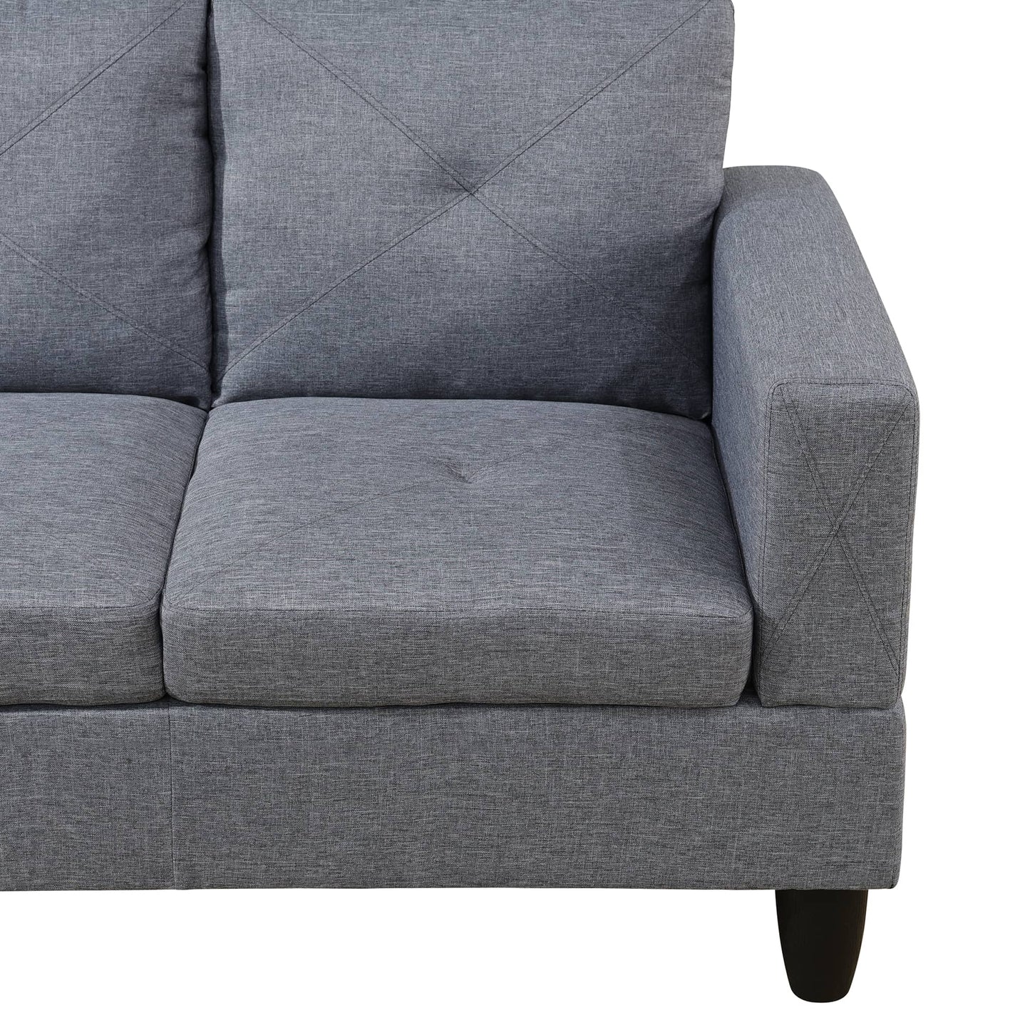 Gray fabric sofa with diamond tufted cushions and modern armrest
