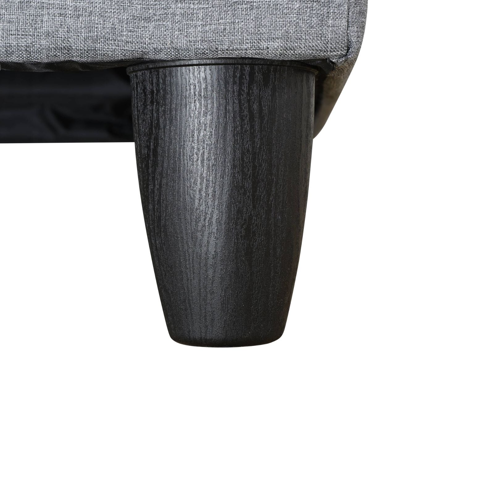 Black wooden furniture leg with textured finish