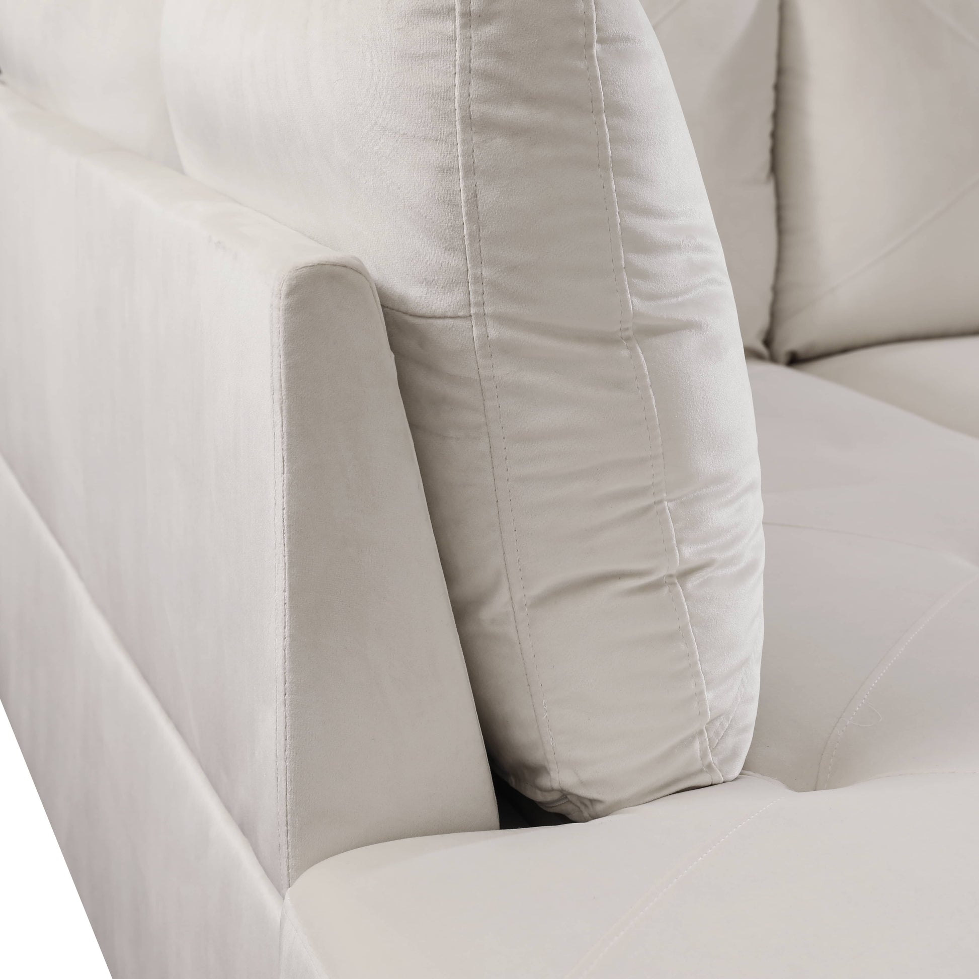 Cream velvet modern sofa armrest detail