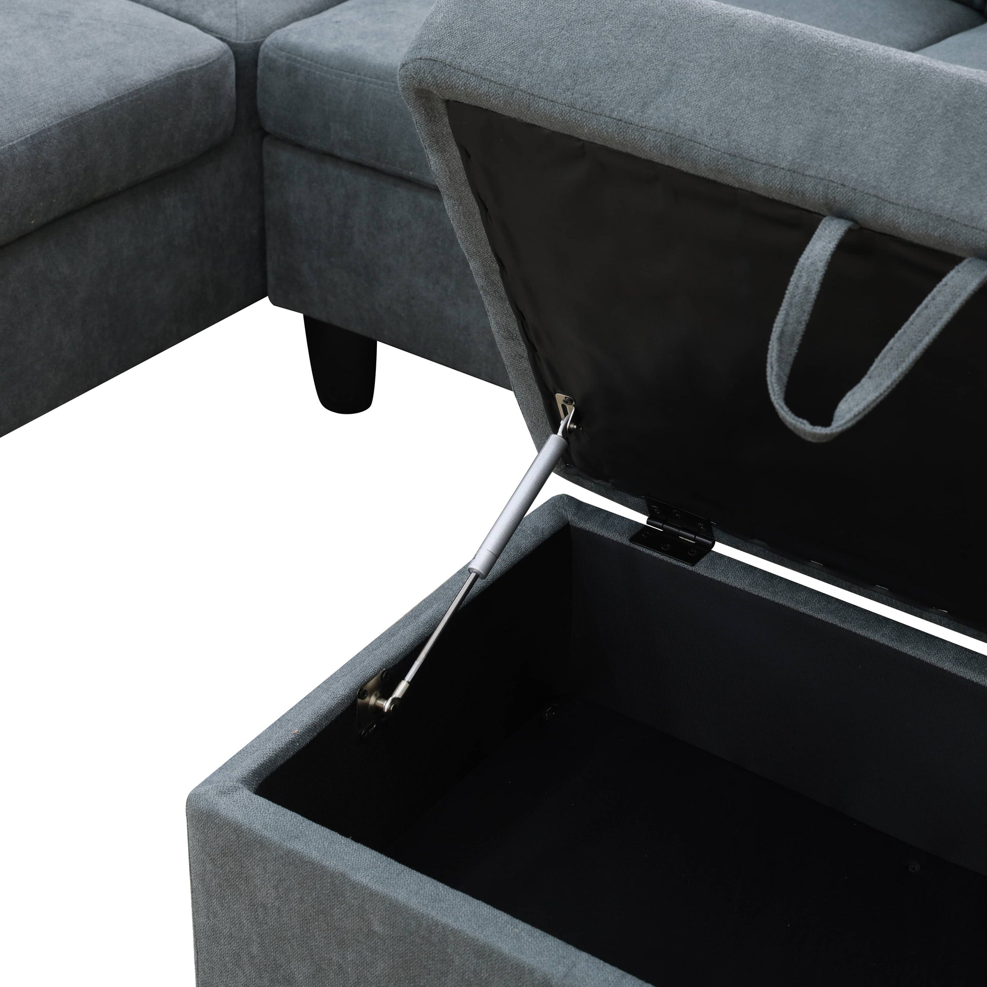 Grey fabric sectional sofa with lifttop storage ottoman detail