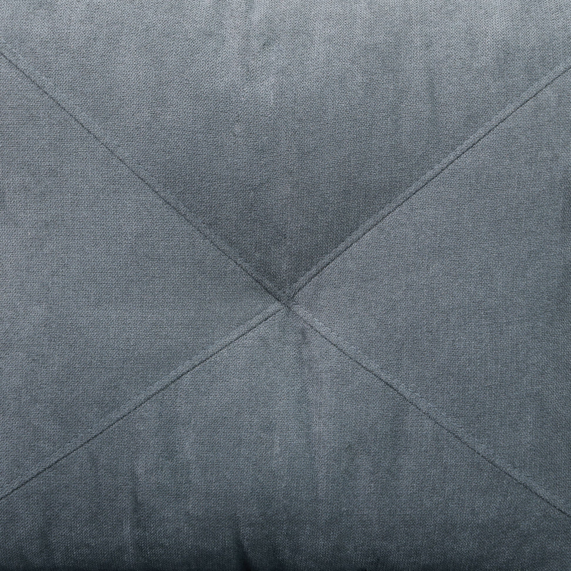 Dark grey tufted fabric texture