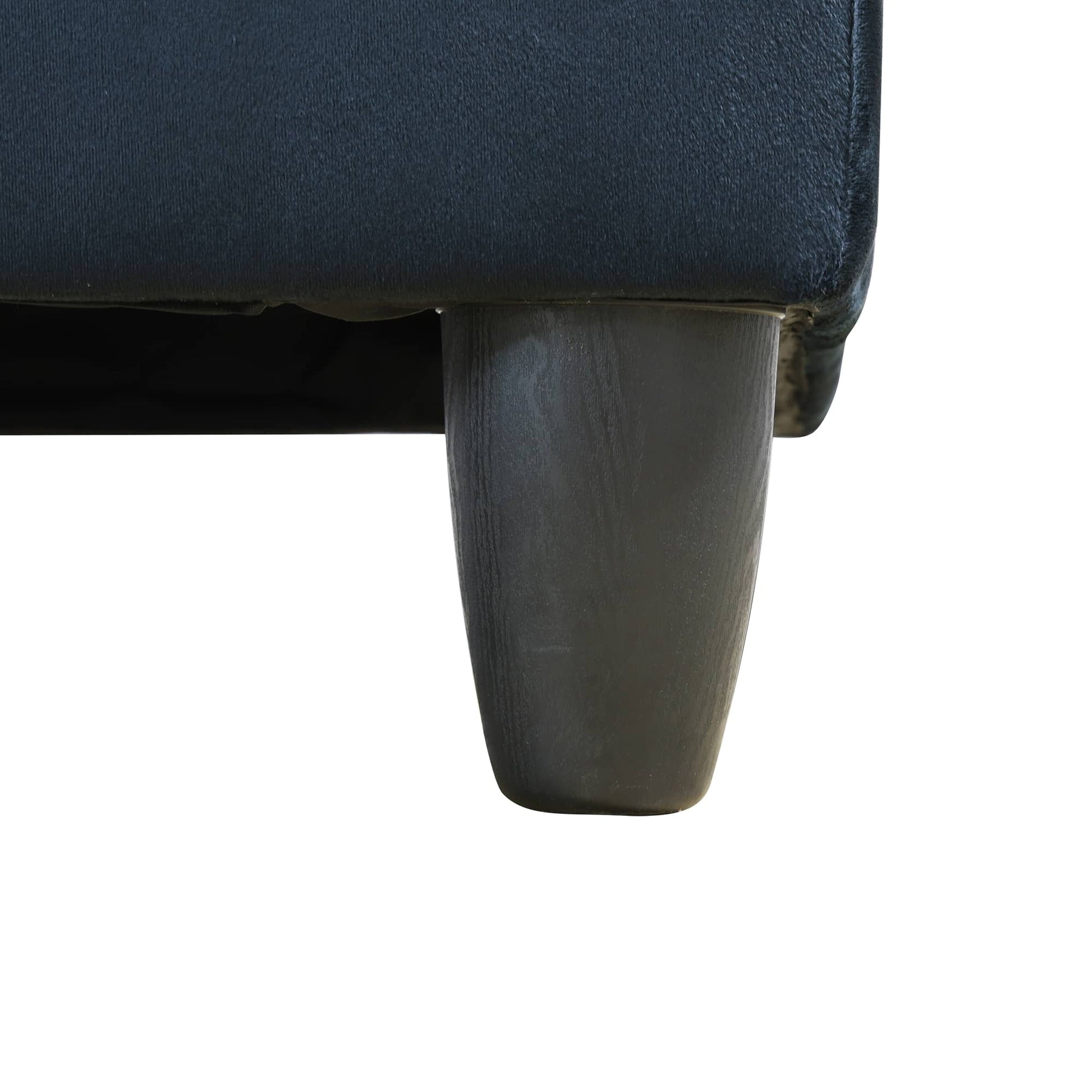 Dark grey sofa leg with textured fabric upholstery