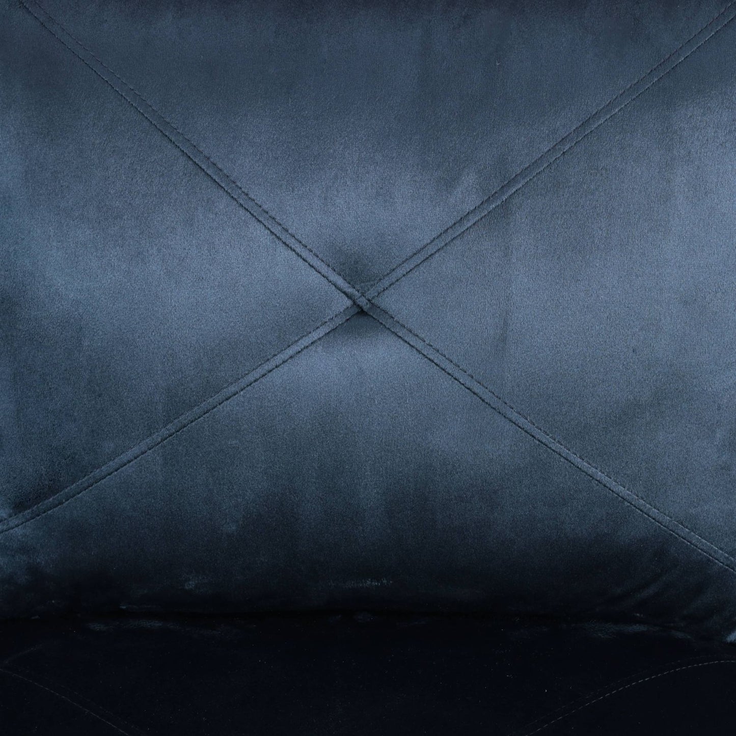 Dark teal velvet fabric with diamond tufting