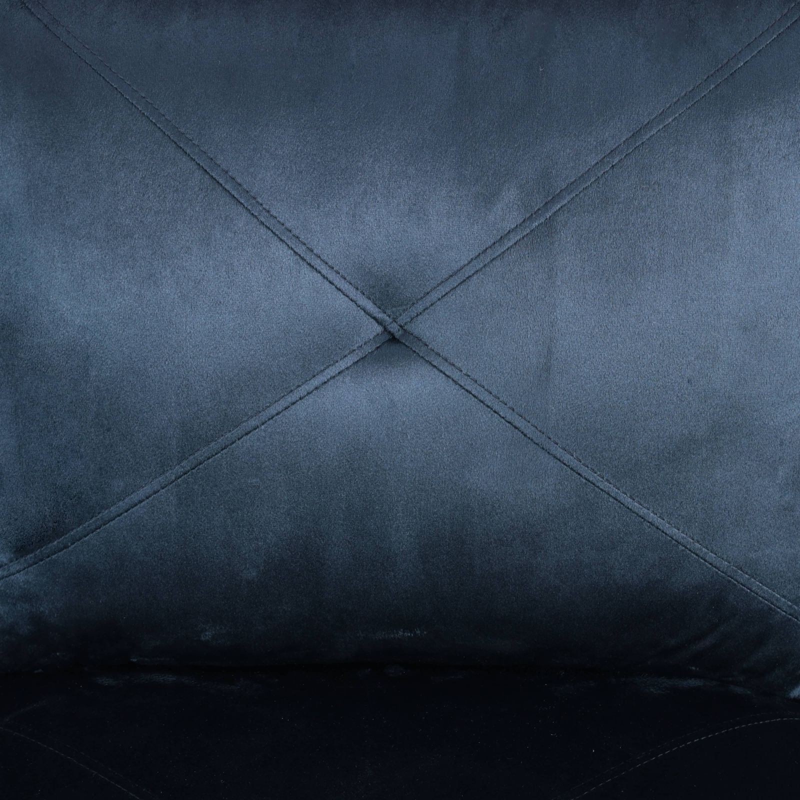 Dark teal velvet fabric with diamond tufting