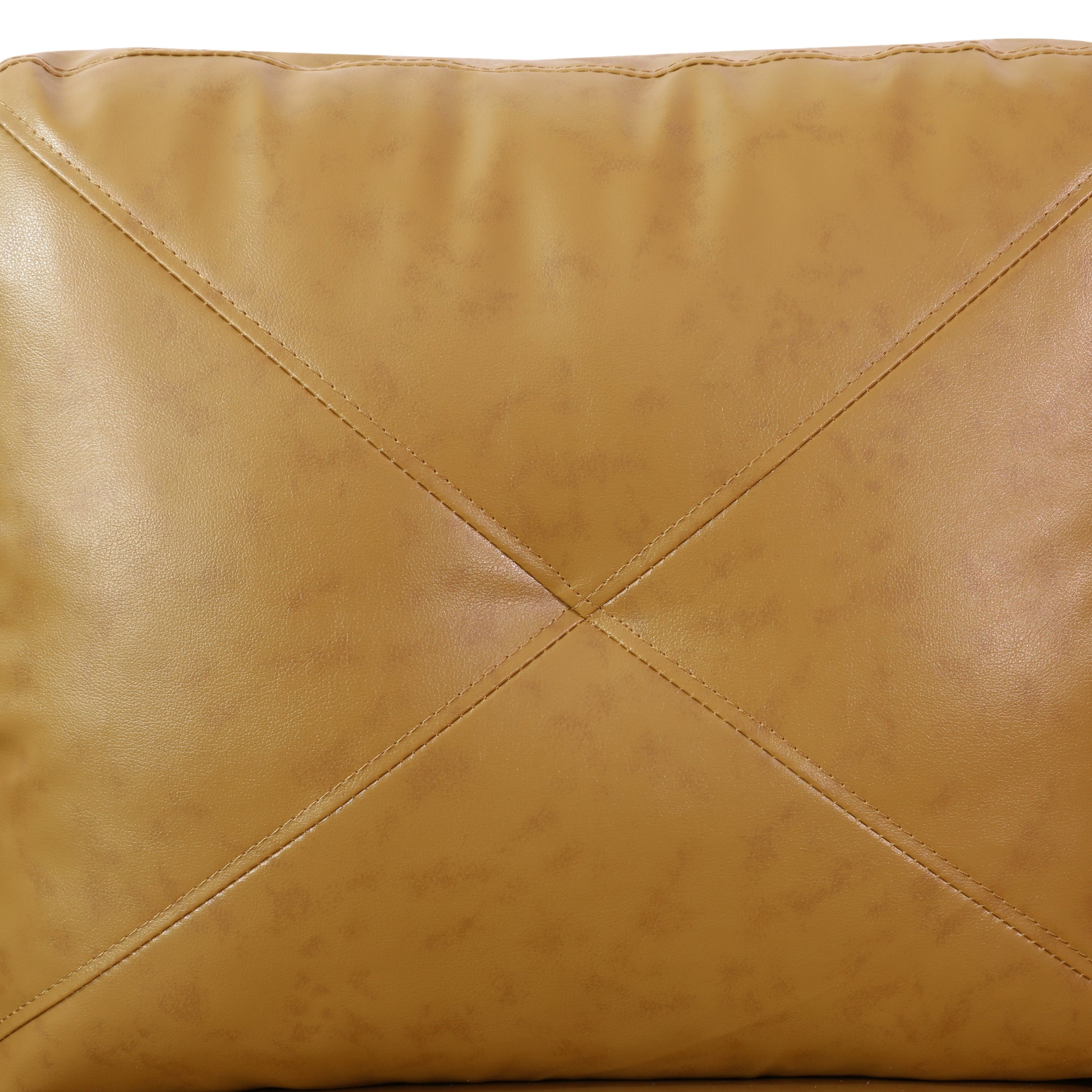 Tan faux leather pillow with diamond stitching detail