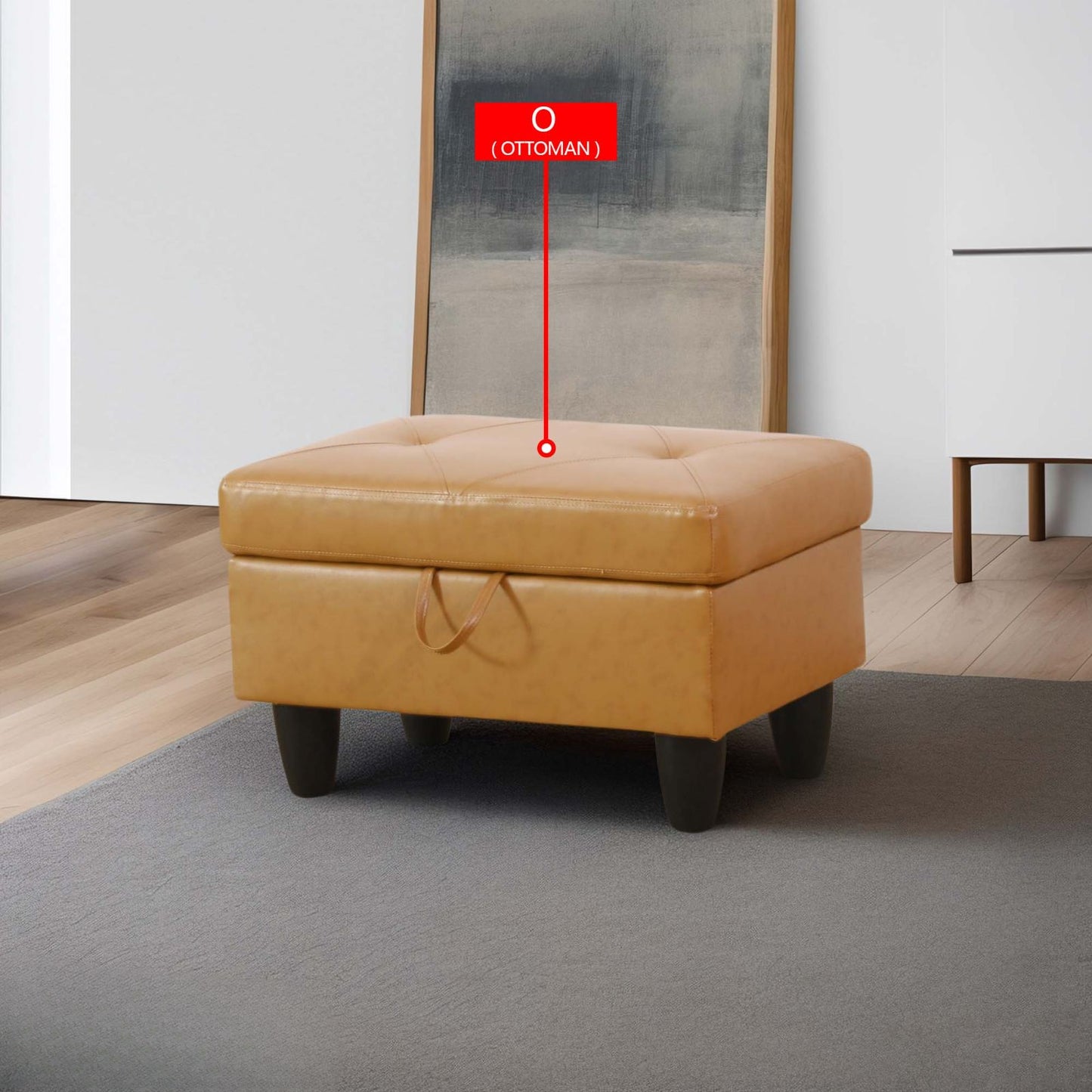 Tufted camel leather storage ottoman with dark wooden legs and side pull tab