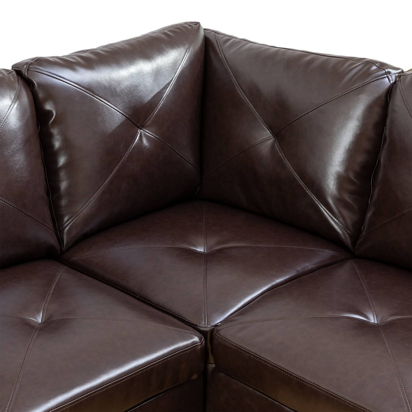 Dark brown leather sectional sofa with diamond stitching detail