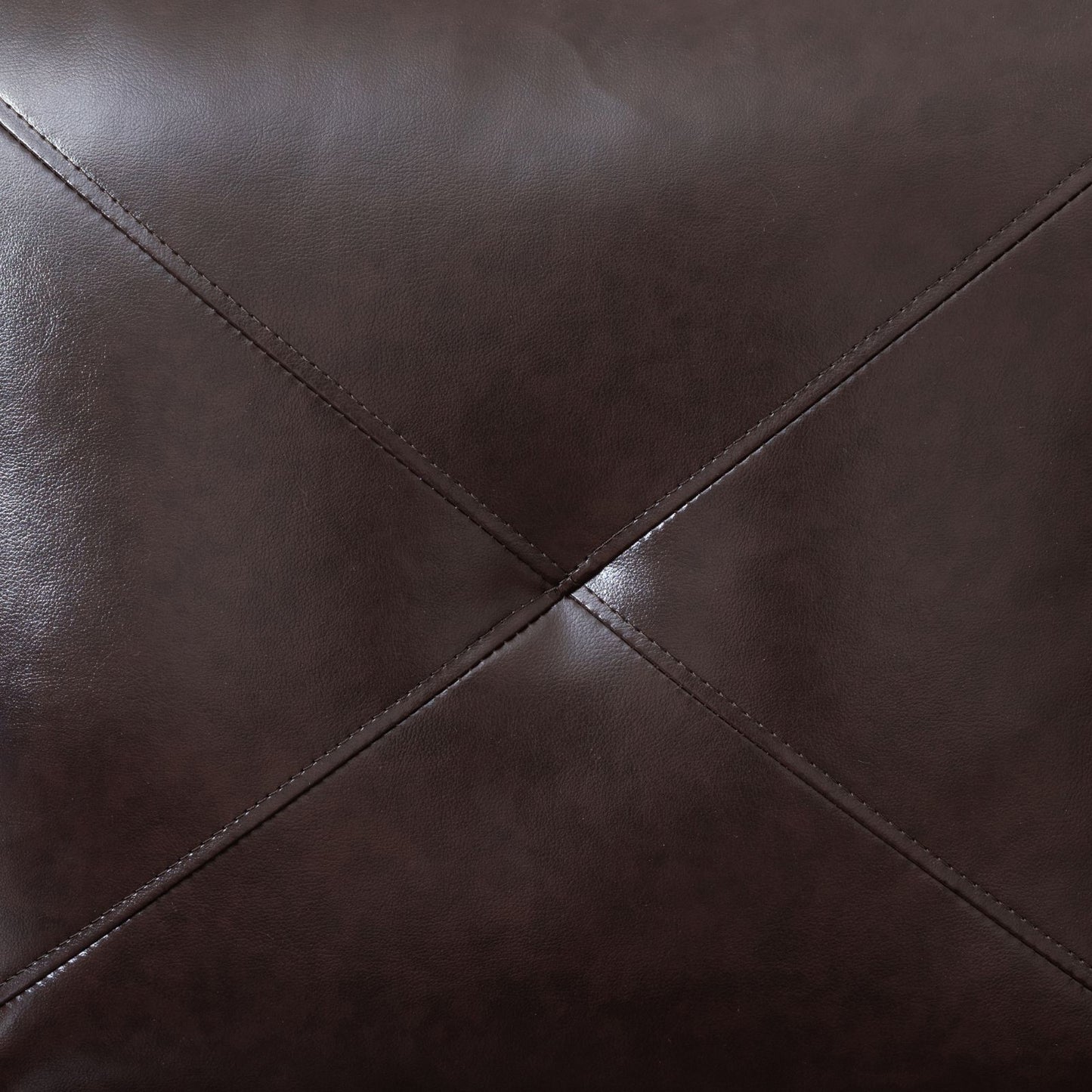 Dark brown faux leather upholstery with diamond stitching detail