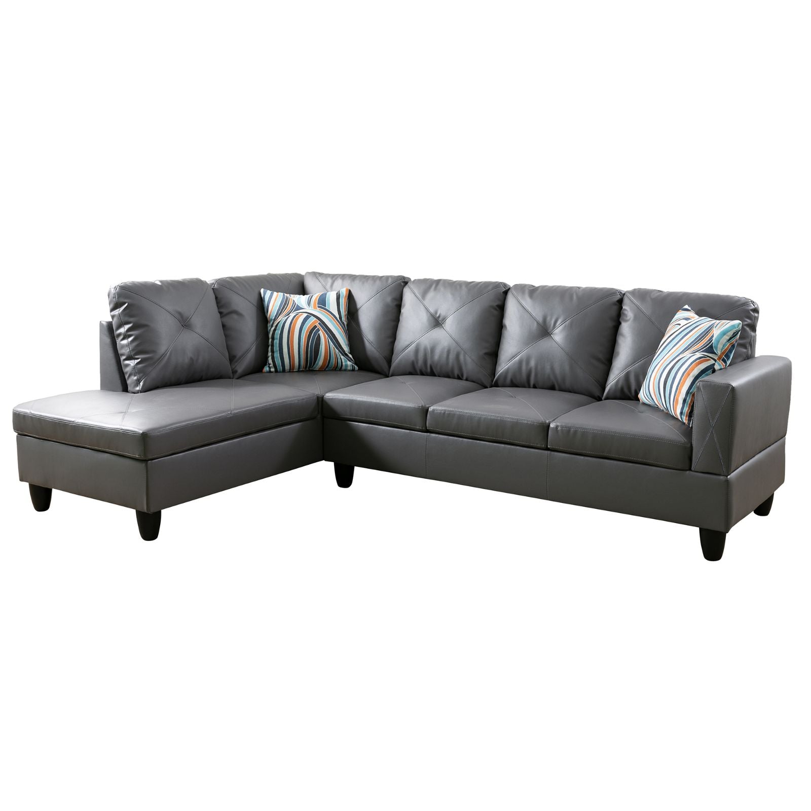 Gray faux leather sectional sofa with diamond tufting and striped accent pillows