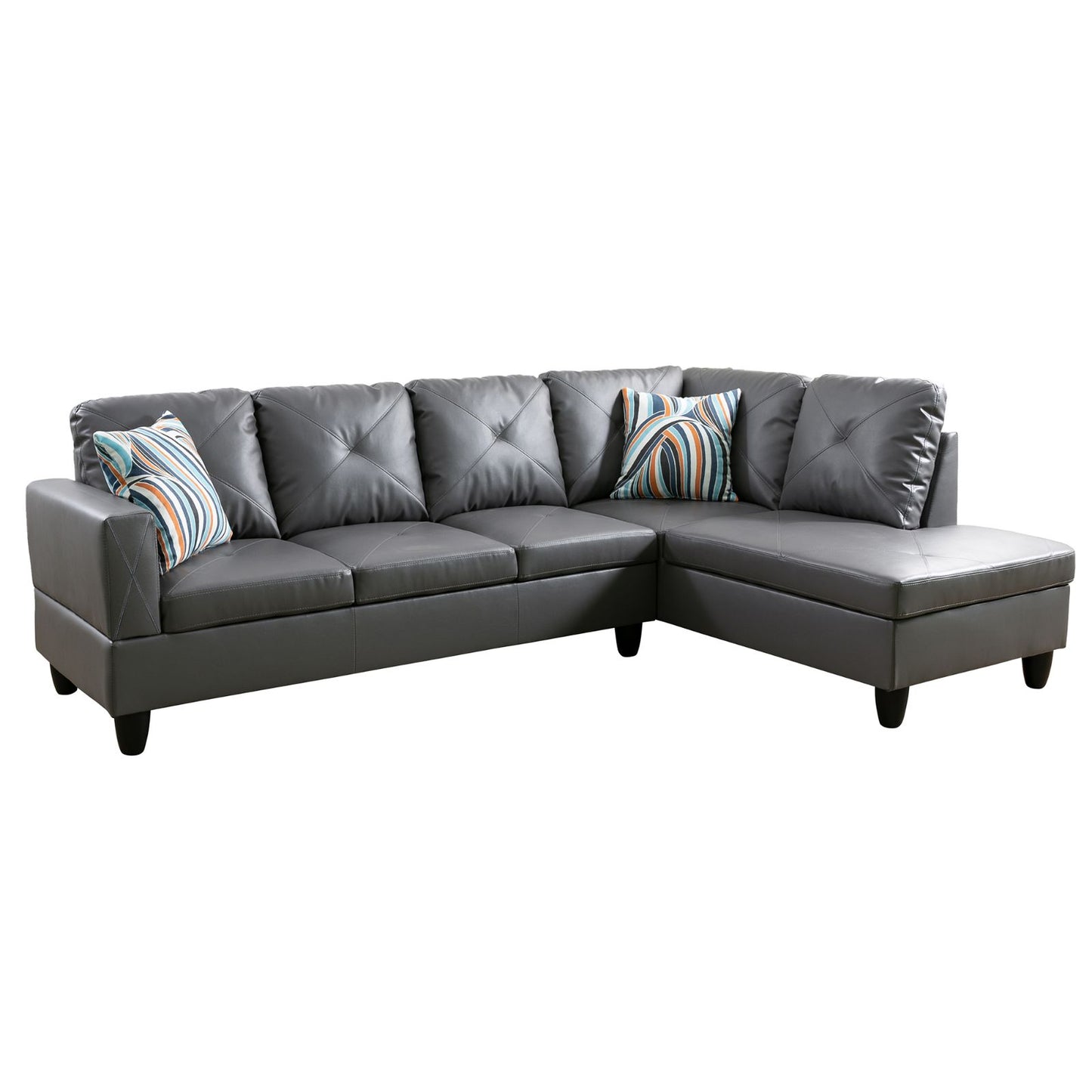 Gray faux leather sectional sofa with tufted cushions and striped throw pillows