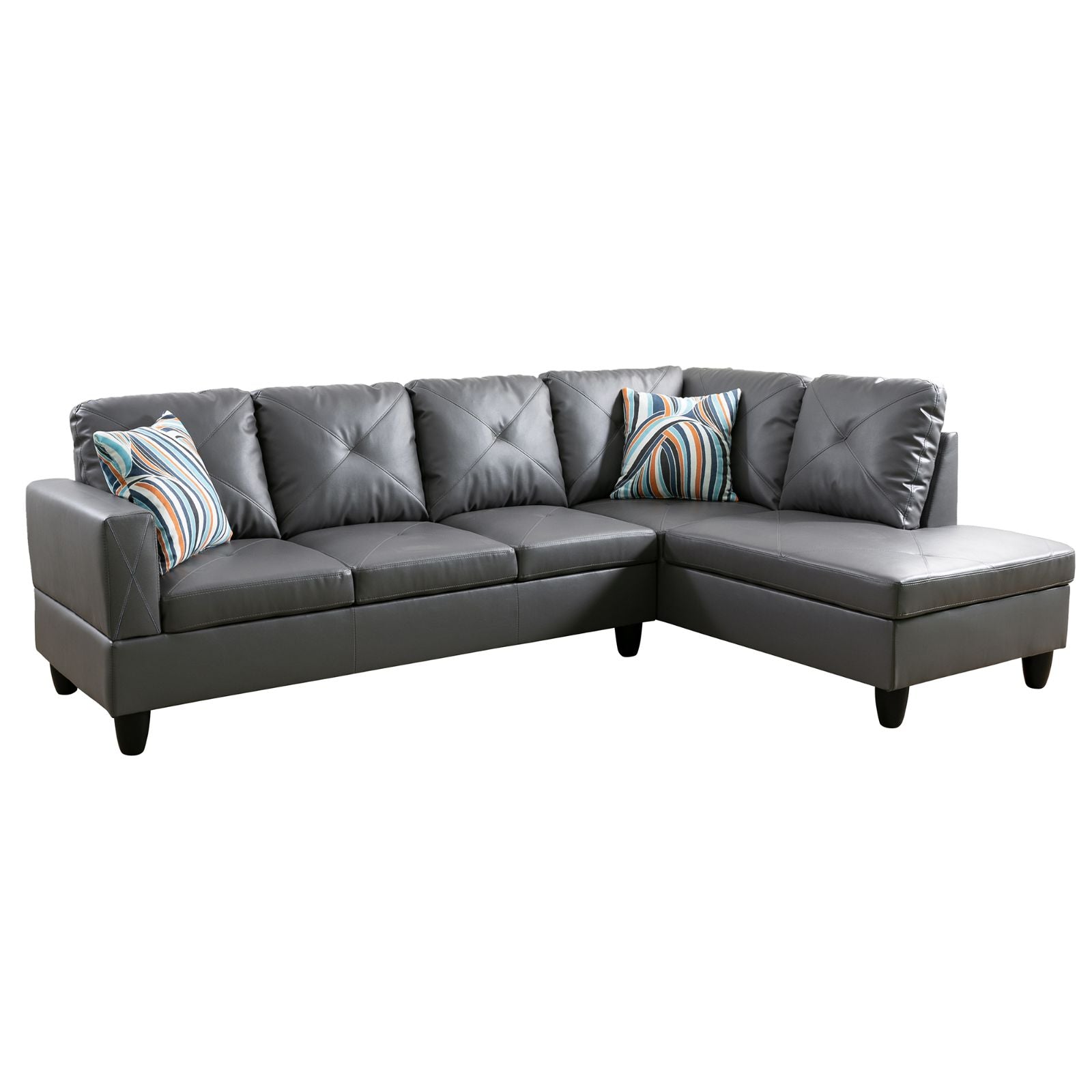 Gray faux leather sectional sofa with tufted cushions and striped throw pillows