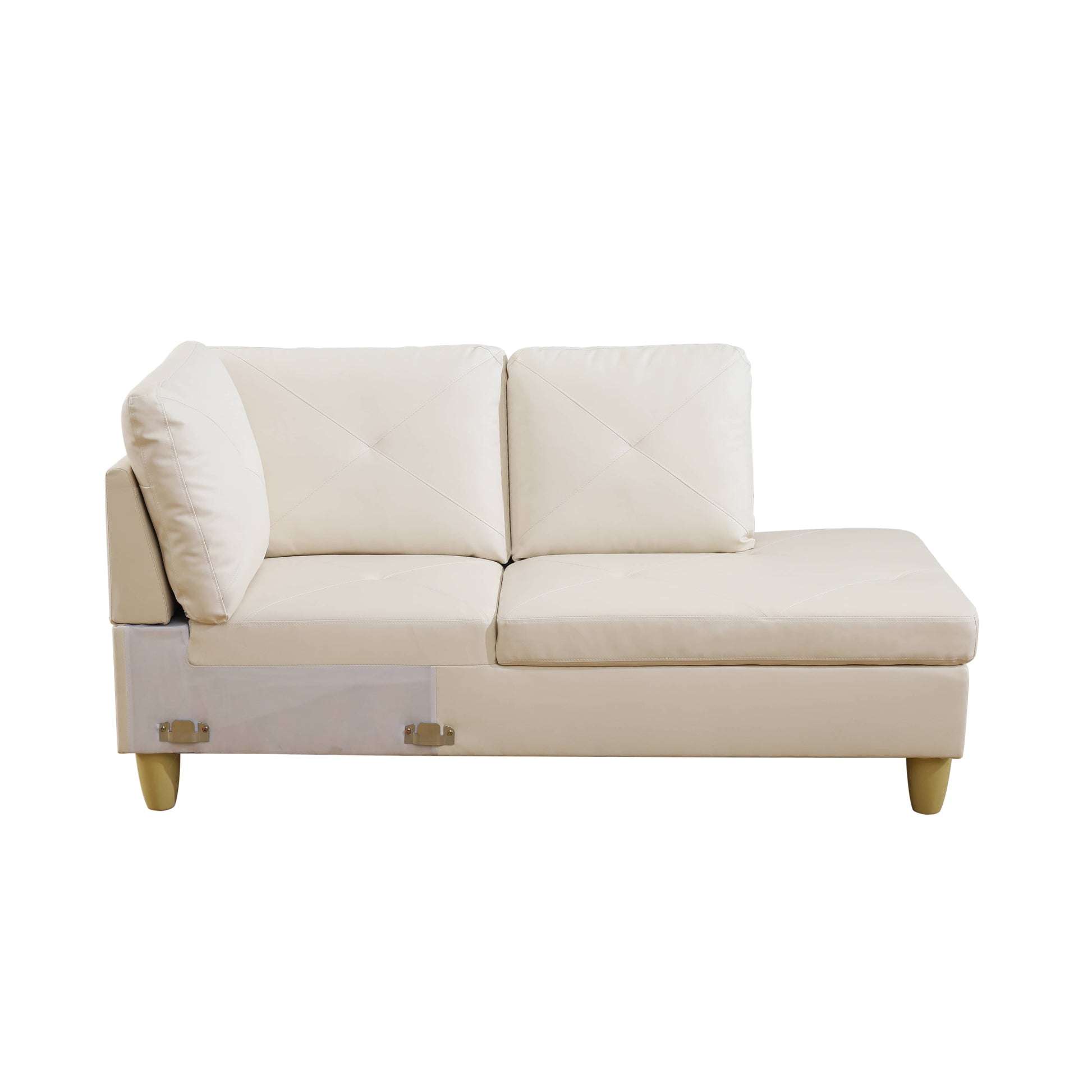 Cream leather sectional sofa with diamondstitched cushions and tapered wooden legs