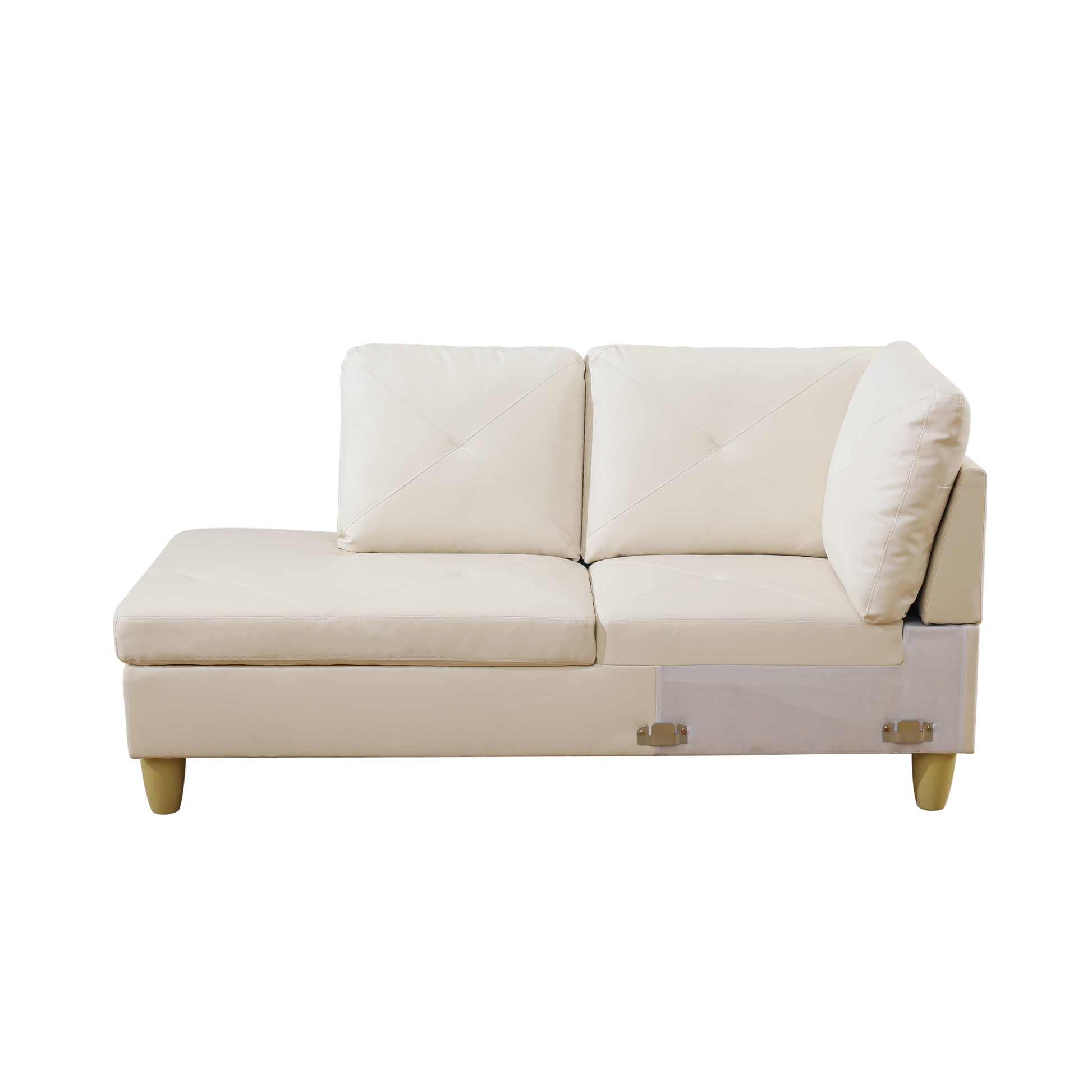 Cream leather sectional sofa with tufted cushions and wooden legs