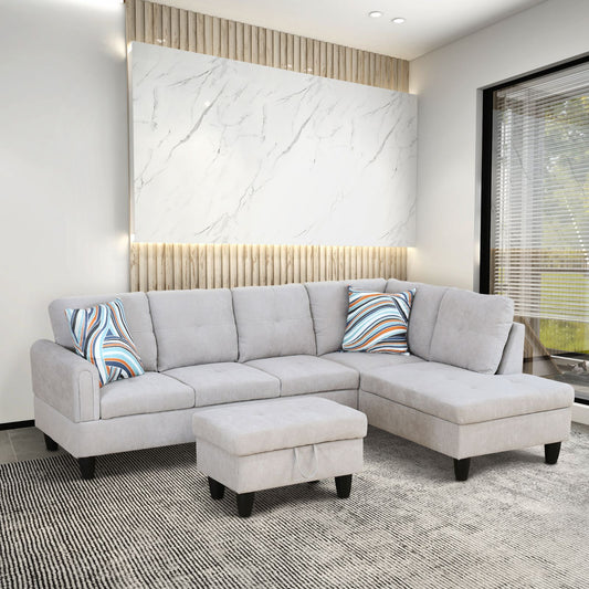 Light gray fabric sectional sofa with ottoman and modern pillows