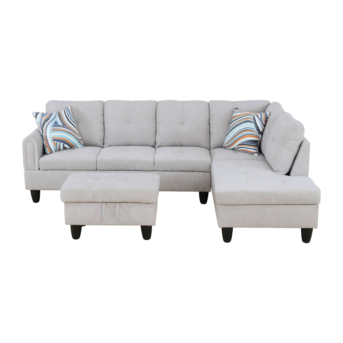 Light grey fabric sectional sofa with tufted cushions and striped throw pillows