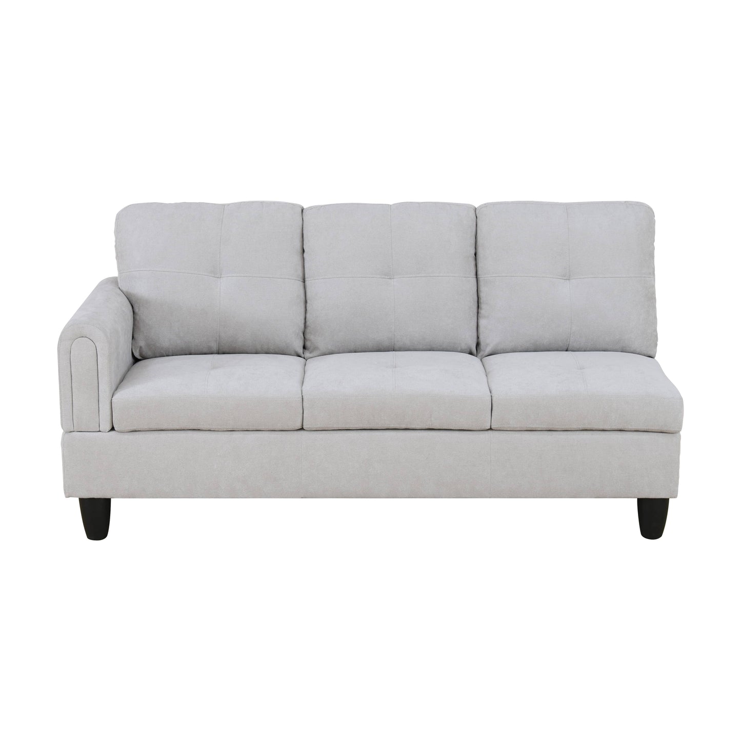 Light gray sectional sofa with three tufted seat cushions and an attached armrest