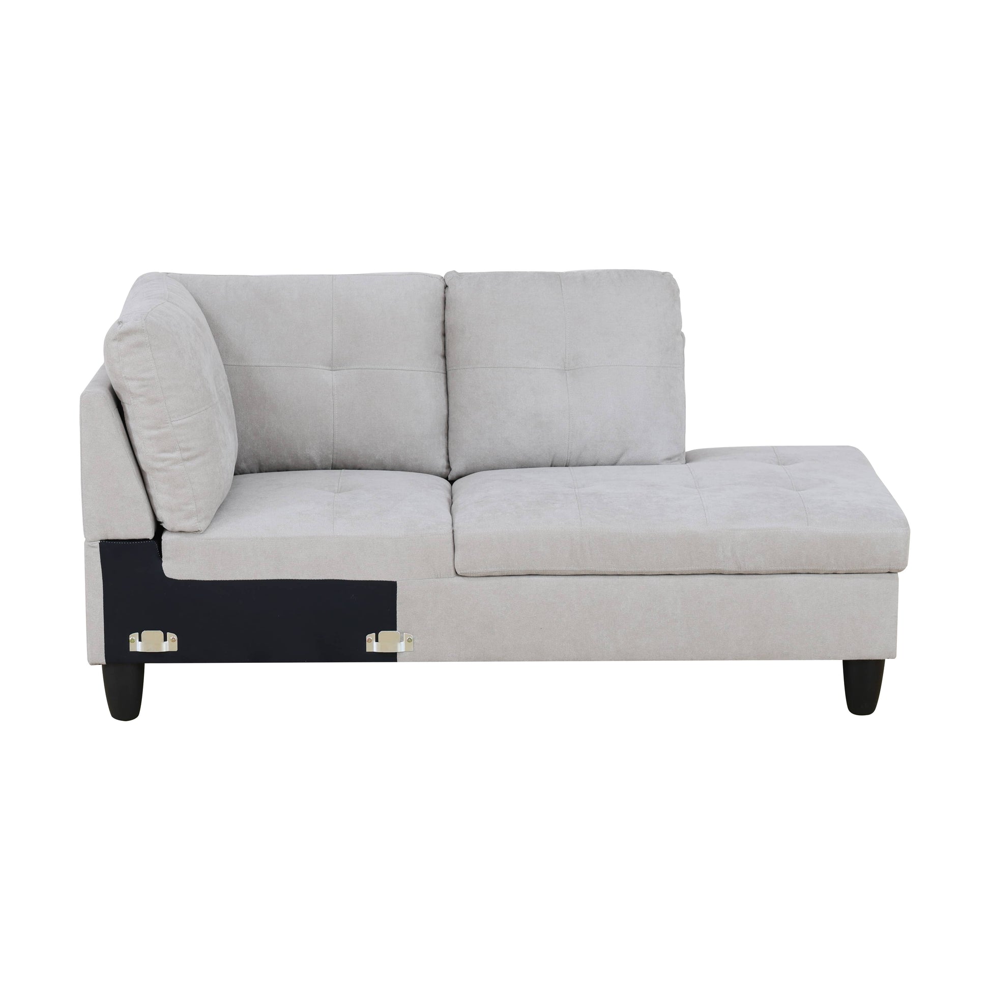 Light gray fabric sectional sofa with tufted cushions and black legs