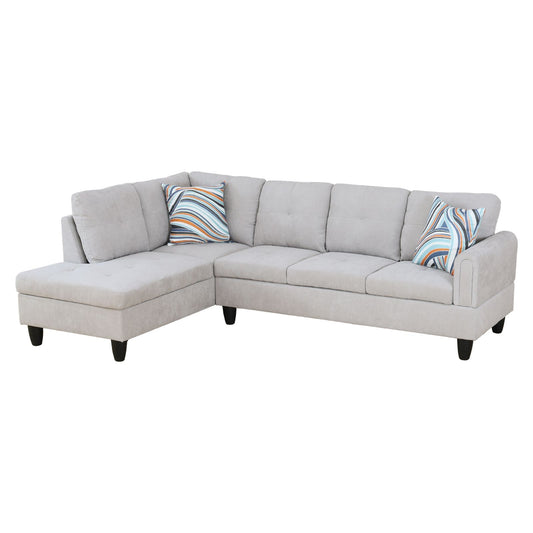 Light grey fabric sectional sofa with tufted cushions and modern design