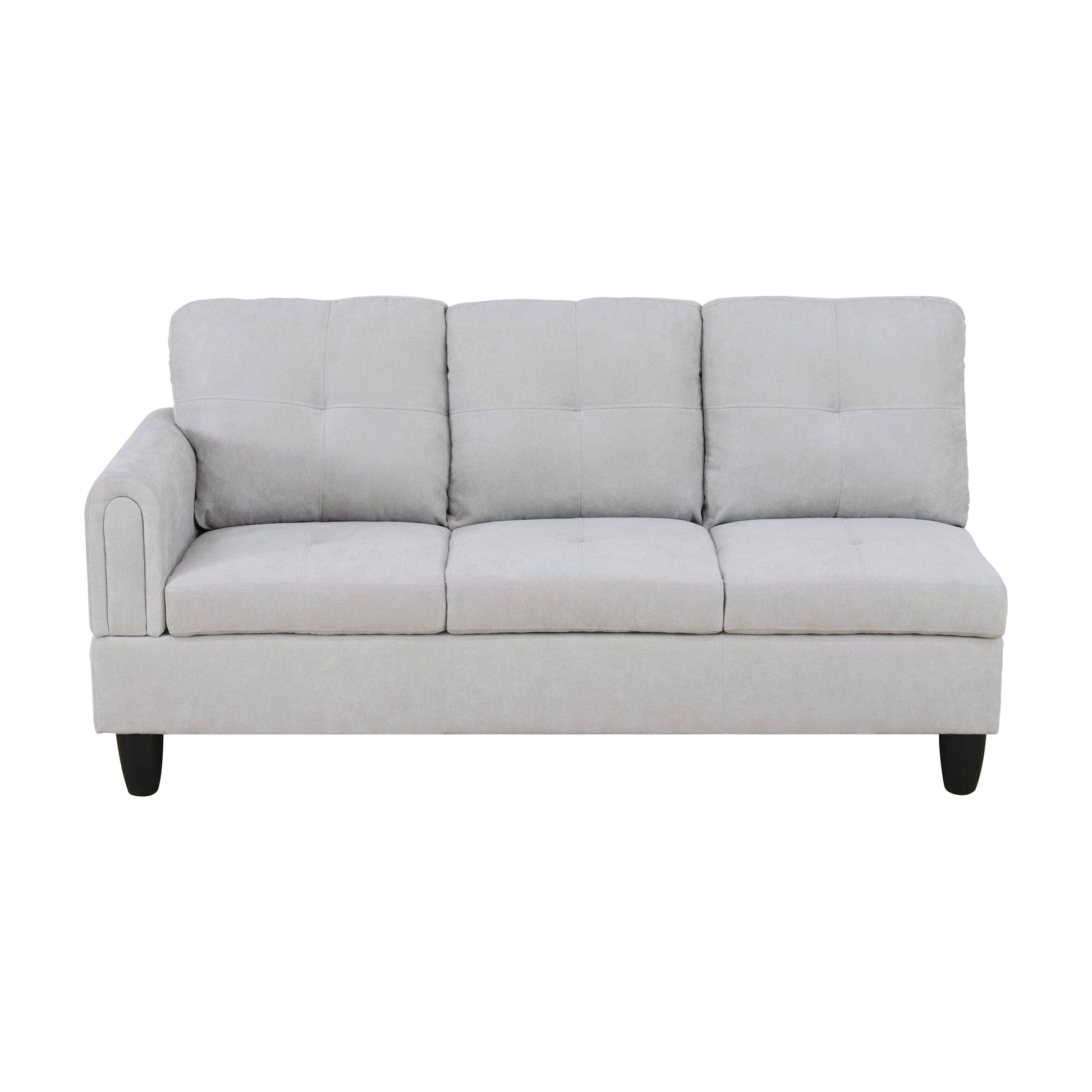 Light grey linen sectional sofa with tufted back cushions and dark tapered legs