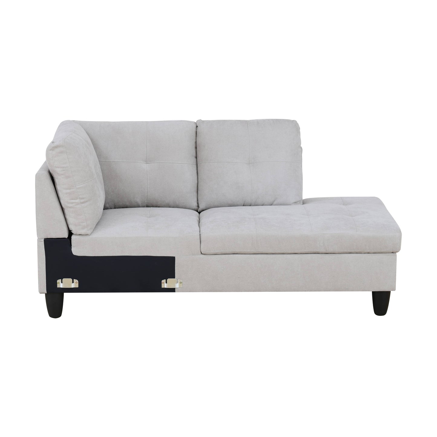 Light gray fabric sectional sofa with tufted cushions and detached panel
