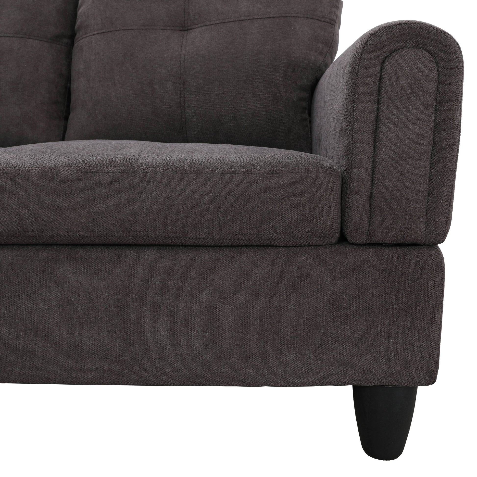 Dark gray fabric sectional sofa armrest detail