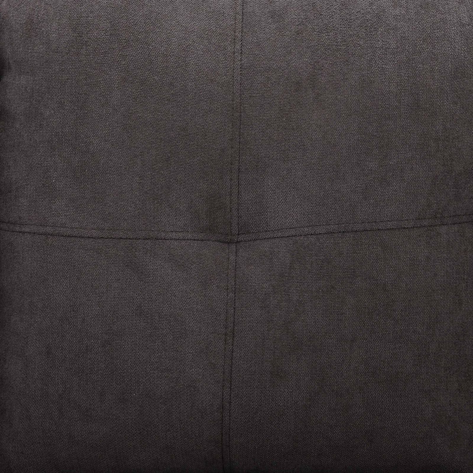 Dark gray textured fabric sofa detail with stitching